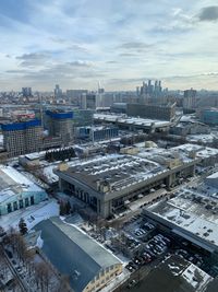 High angle view of buildings in city during winter