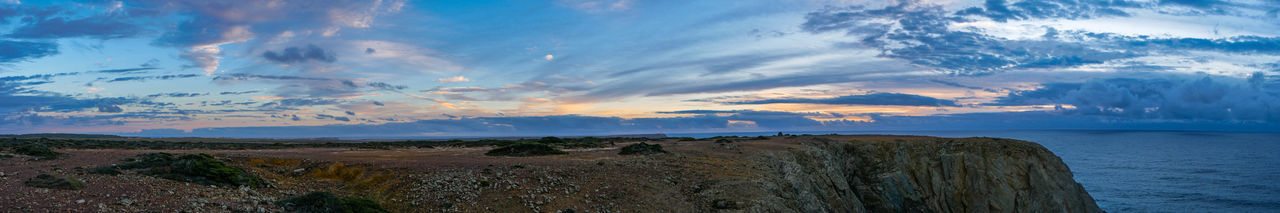 Panoramic view of sea against sky during sunset