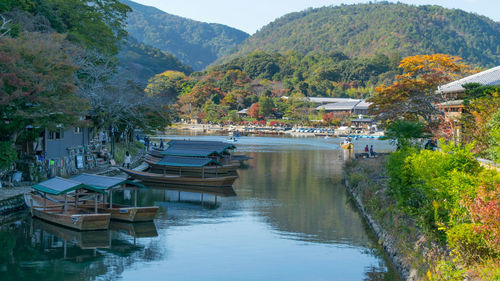 Scenic view of lake with mountains in background