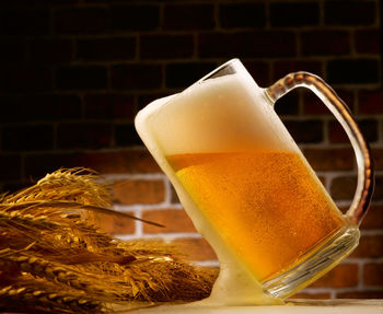 Close-up of beer glass on table