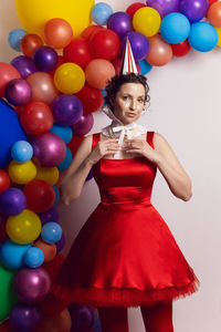 Young woman with balloons