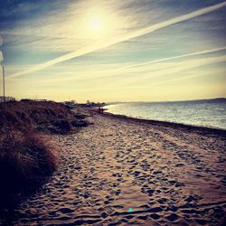 Scenic view of beach against sky