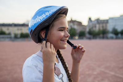 Young woman drinking water