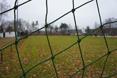 Close-up of soccer goal against sky