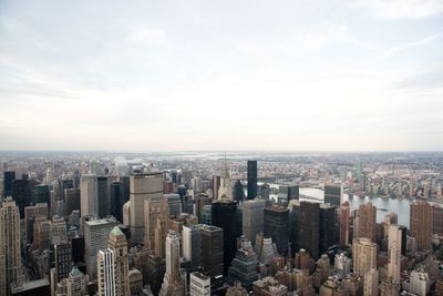 High angle view of buildings in city against sky