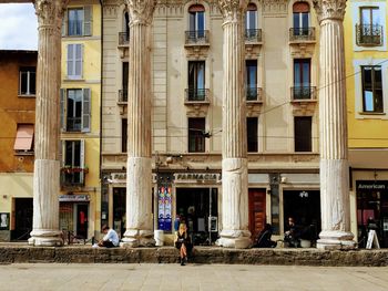 People in front of building