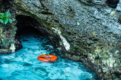 View of rock in water