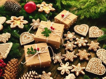 High angle view of christmas decorations with cookies on table