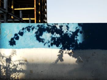 Close-up of window against blue sky