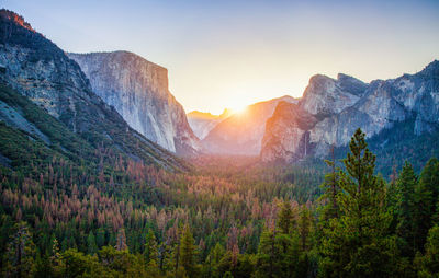 Scenic view of mountains against sky during sunset