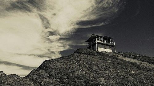 View of mountain against cloudy sky