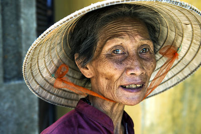 Portrait of woman wearing hat