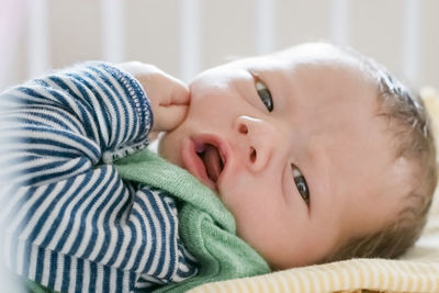 Close-up portrait of cute baby at home