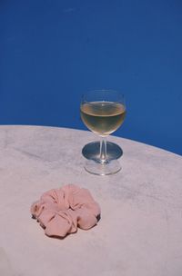 Close-up of wineglass on table