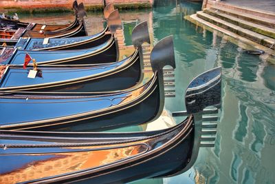High angle view of boats moored in canal