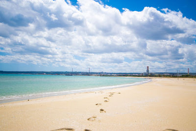Scenic view of beach against sky
