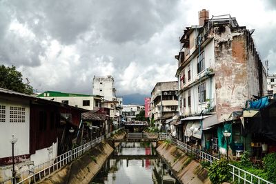 Panoramic view of buildings in city against sky