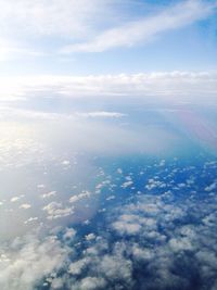 Aerial view of landscape against cloudy sky