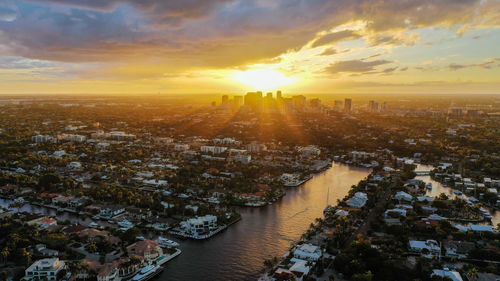 High angle view of city against sky during sunset