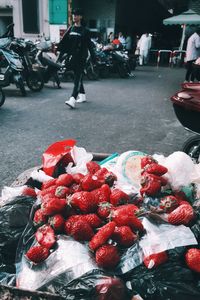 People at market stall in city