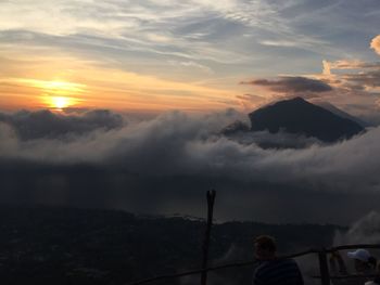 Scenic view of mountains against sky during sunset