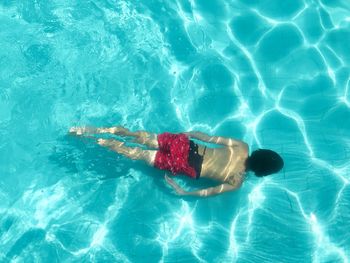 High angle view of person swimming in pool