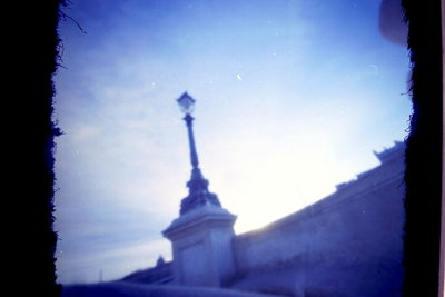 Low angle view of built structure against blue sky