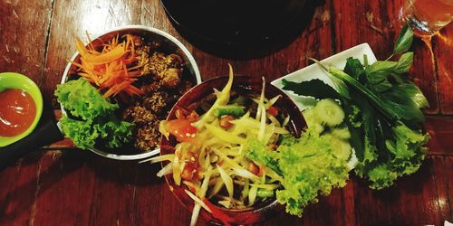 High angle view of vegetables in plate on table