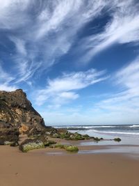 Scenic view of beach against sky