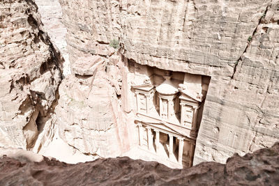 Low angle view of rock formation on building