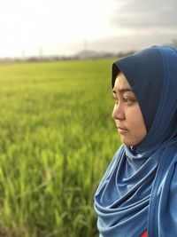 Portrait of woman on padi field