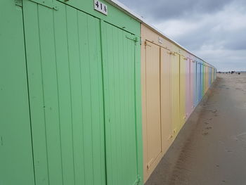 Beach huts against sky