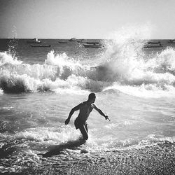 Man surfing in sea