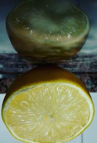 Close-up of fruit over white background