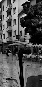 Woman standing in city