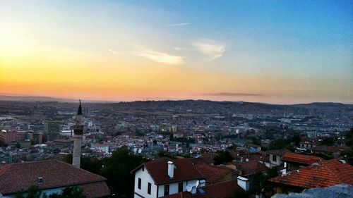 High angle view of townscape against sky during sunset