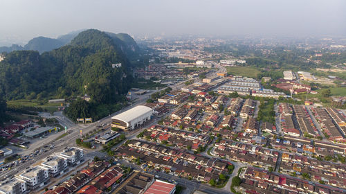 Aerial view of 'ipoh' landmark on a limestone mountain in ipoh city, malaysia.