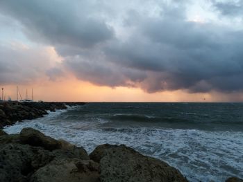 Scenic view of sea against sky during sunset