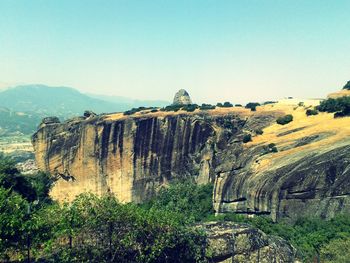 Scenic view of landscape against clear blue sky