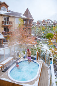 High angle view of swimming pool in city