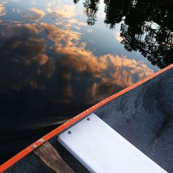 Low angle view of cropped car against sky