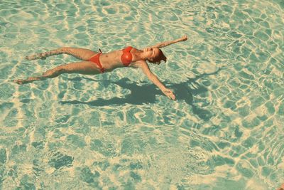 High angle view of man swimming in pool