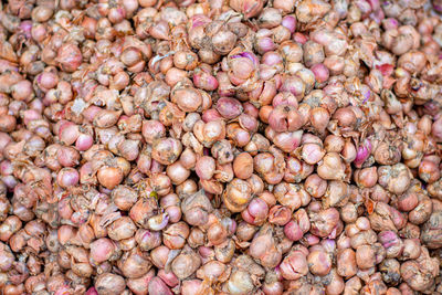 Full frame shot of onions for sale at market stall