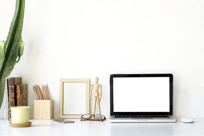 Close-up of laptop on table