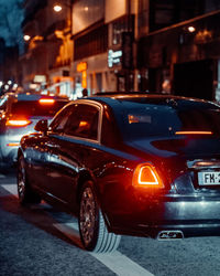 Traffic on city street at night