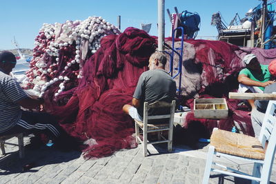 People working on market stall