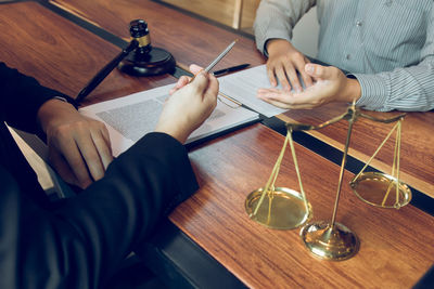 High angle view of people on table