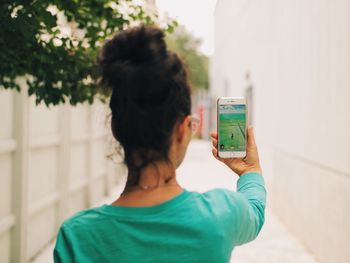 WOMAN LOOKING AT CAMERA