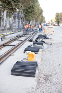 View of construction site by road in city