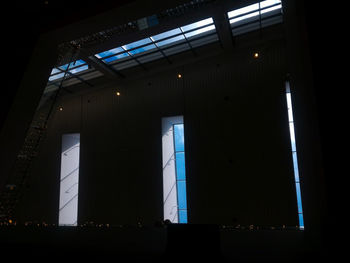 Low angle view of illuminated window in building